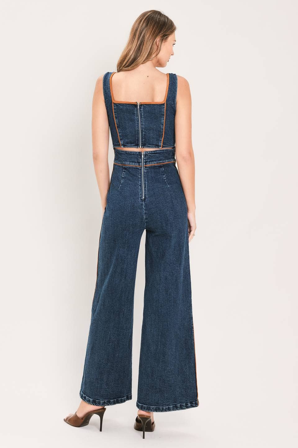 A washed denim jumpsuit