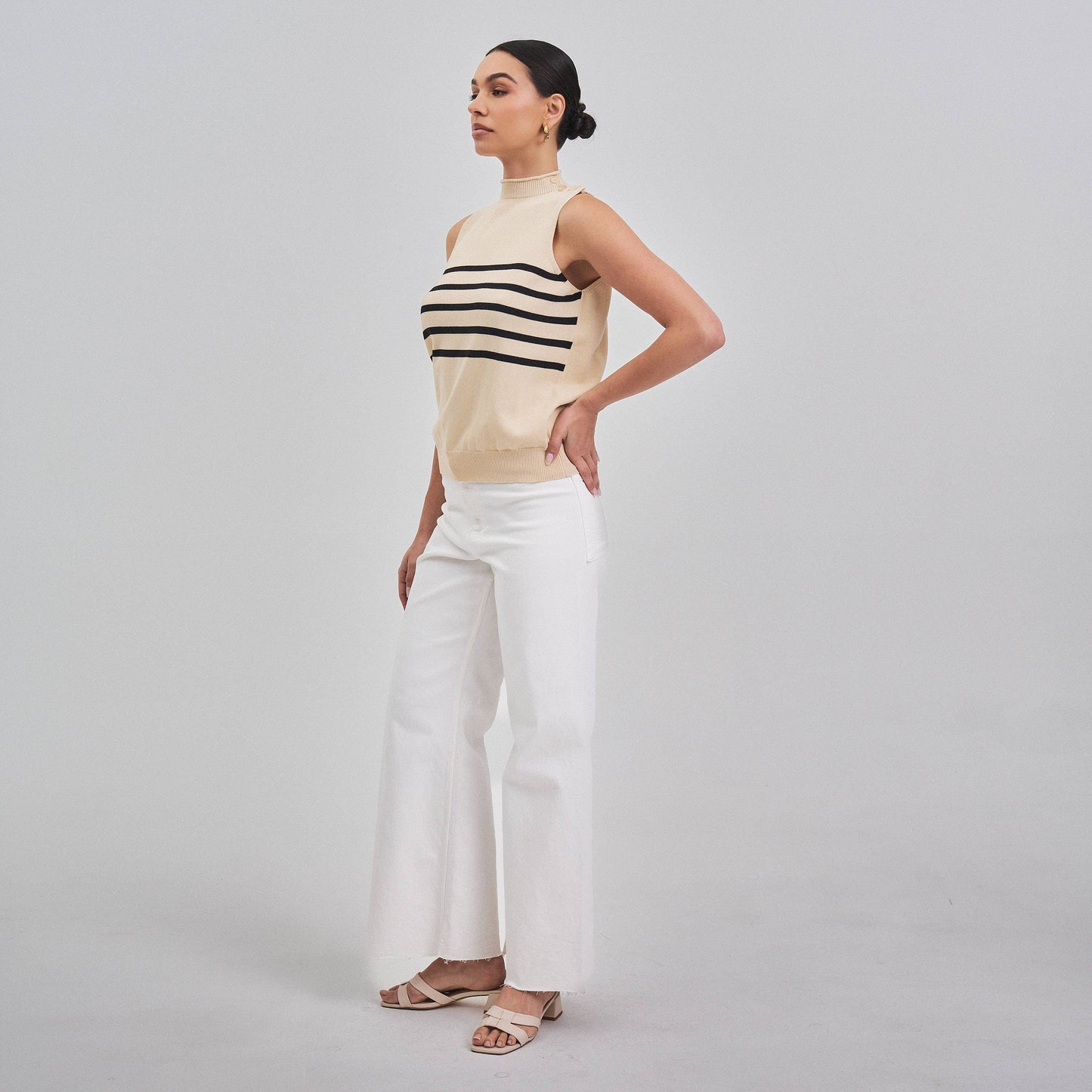 Sleeveless mock neck striped sweater