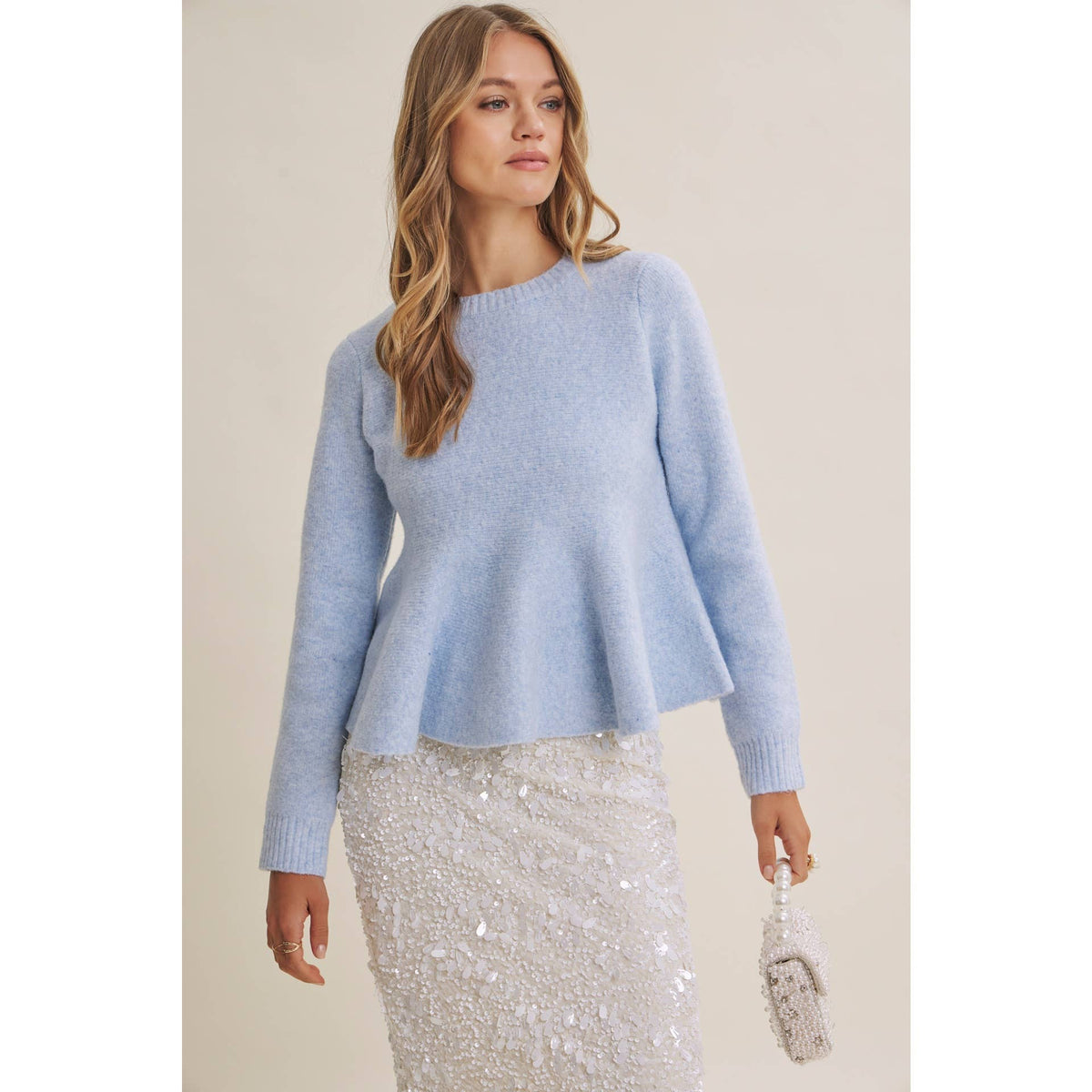 PEPLUM WOOL SWEATER
