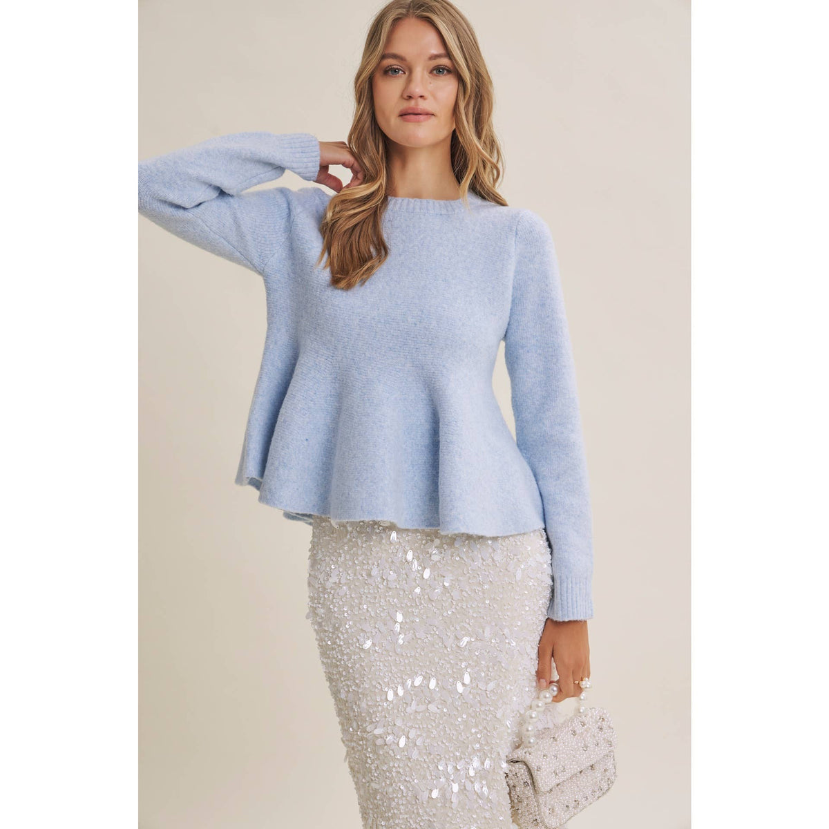 PEPLUM WOOL SWEATER