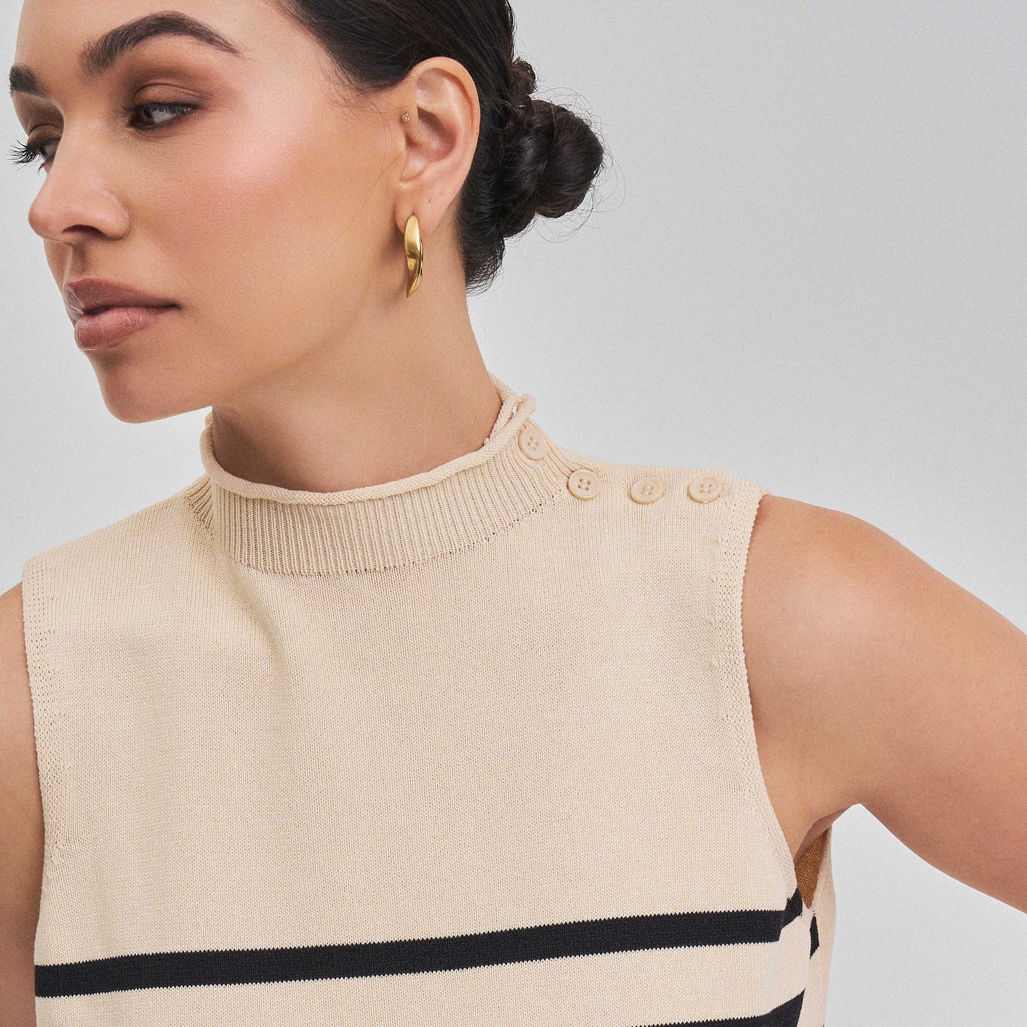 Sleeveless mock neck striped sweater