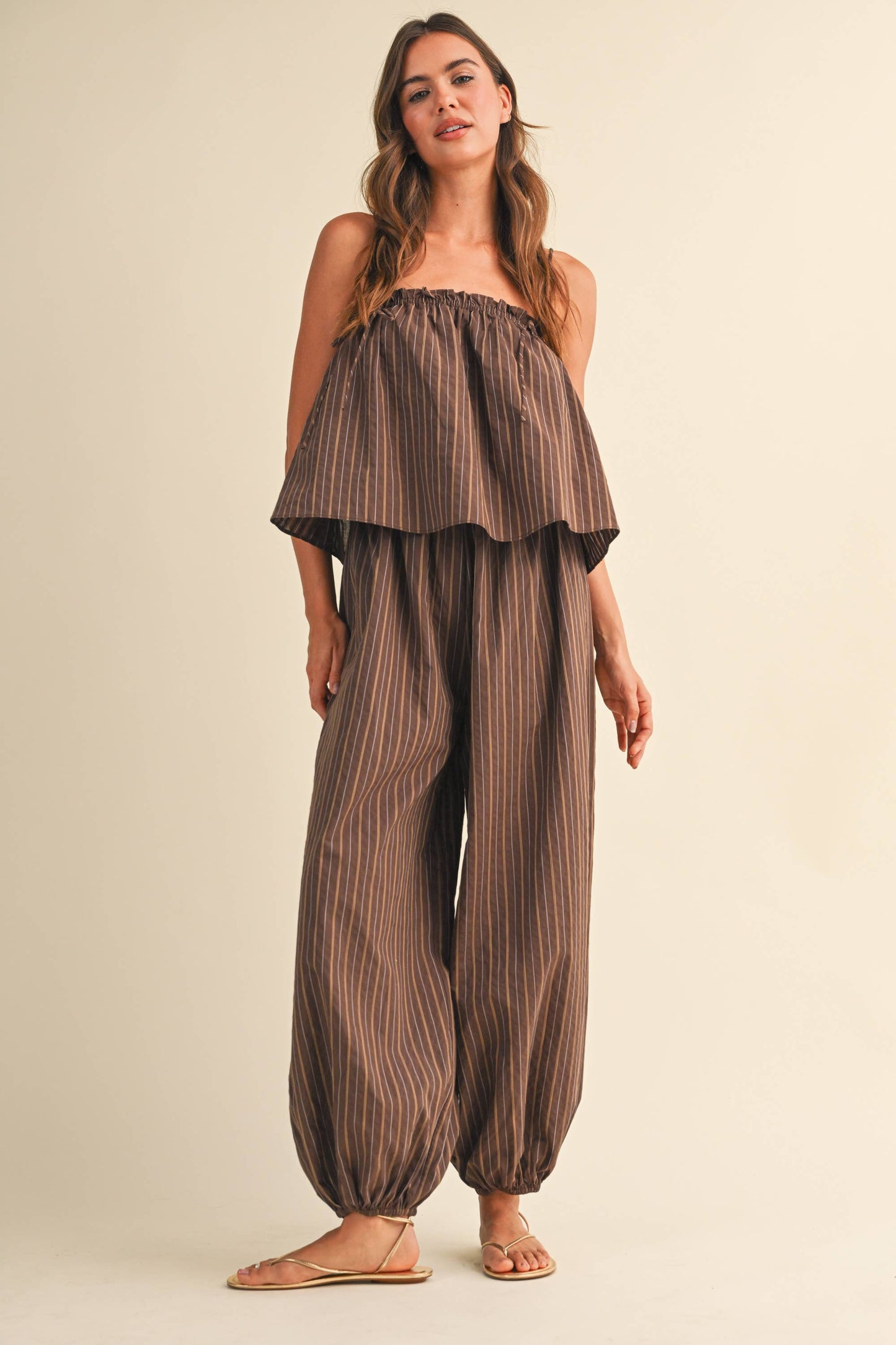 STRIPED SLEEVELESS FLOWY JUMPSUIT