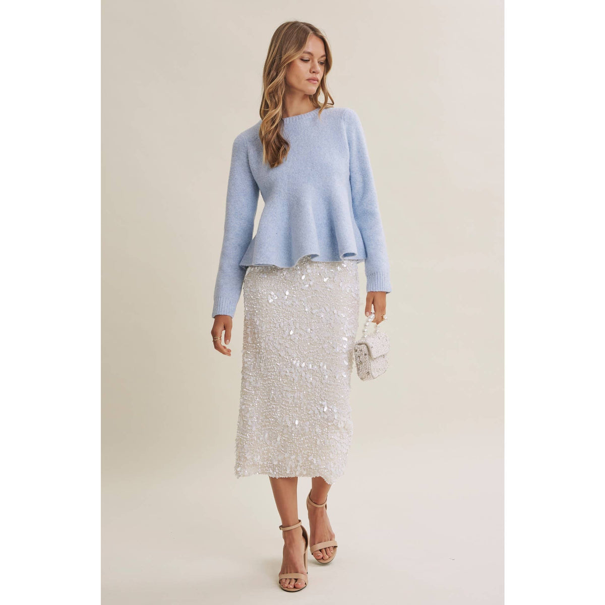 PEPLUM WOOL SWEATER