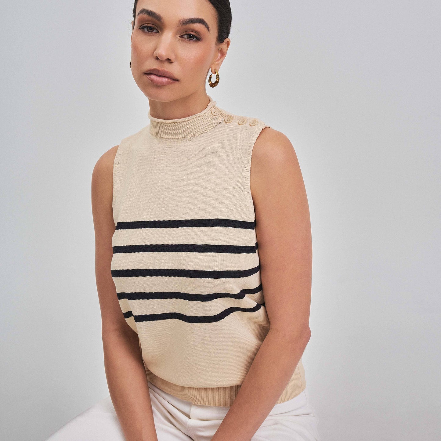 Sleeveless mock neck striped sweater