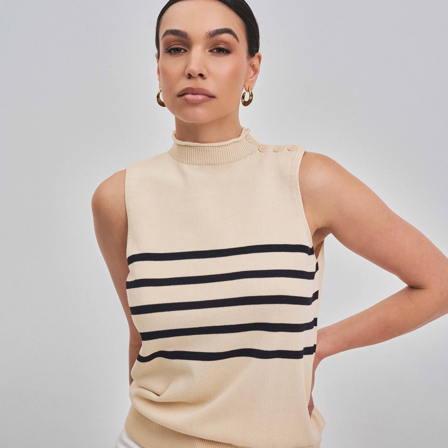 Sleeveless mock neck striped sweater