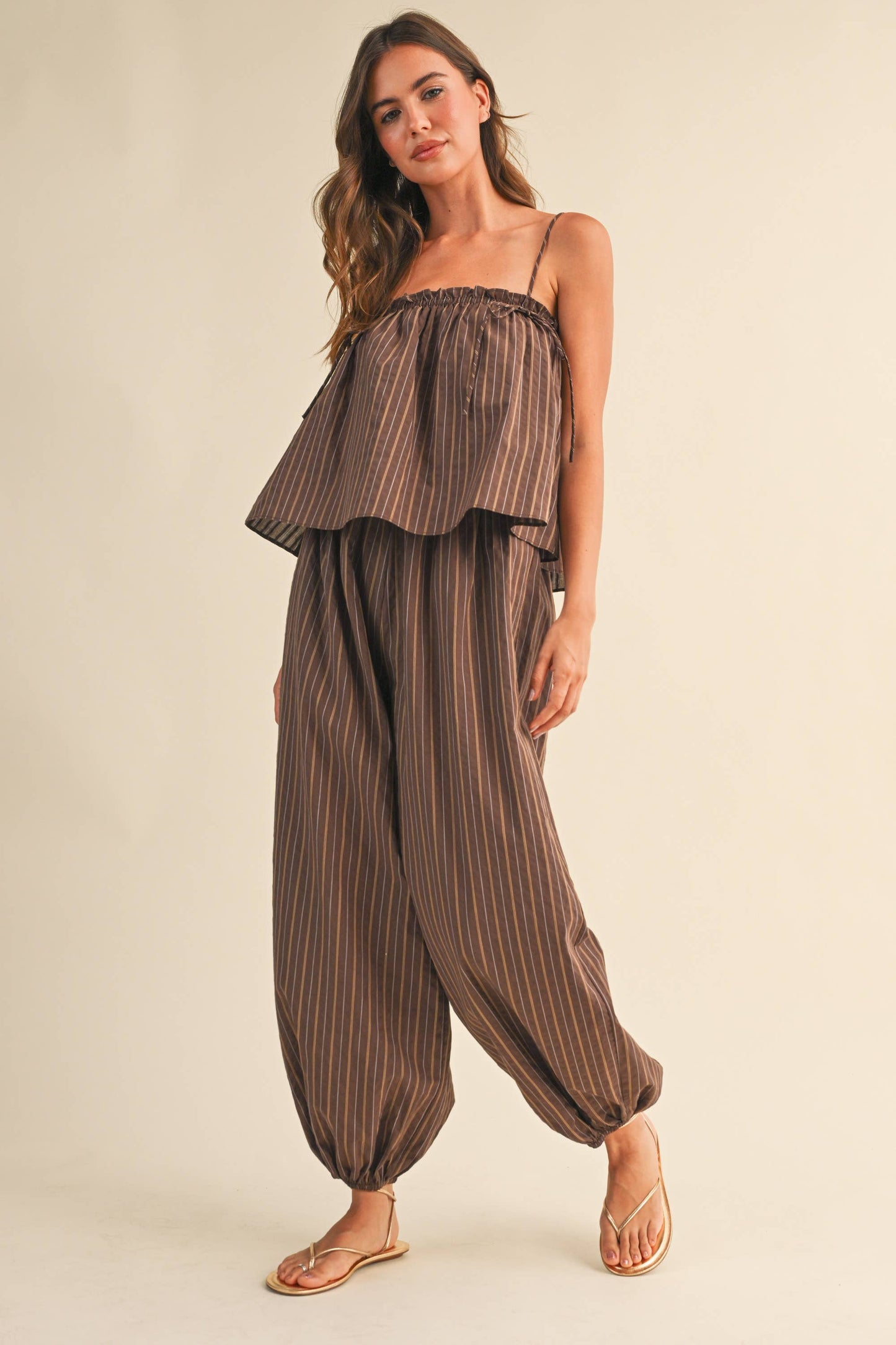 STRIPED SLEEVELESS FLOWY JUMPSUIT