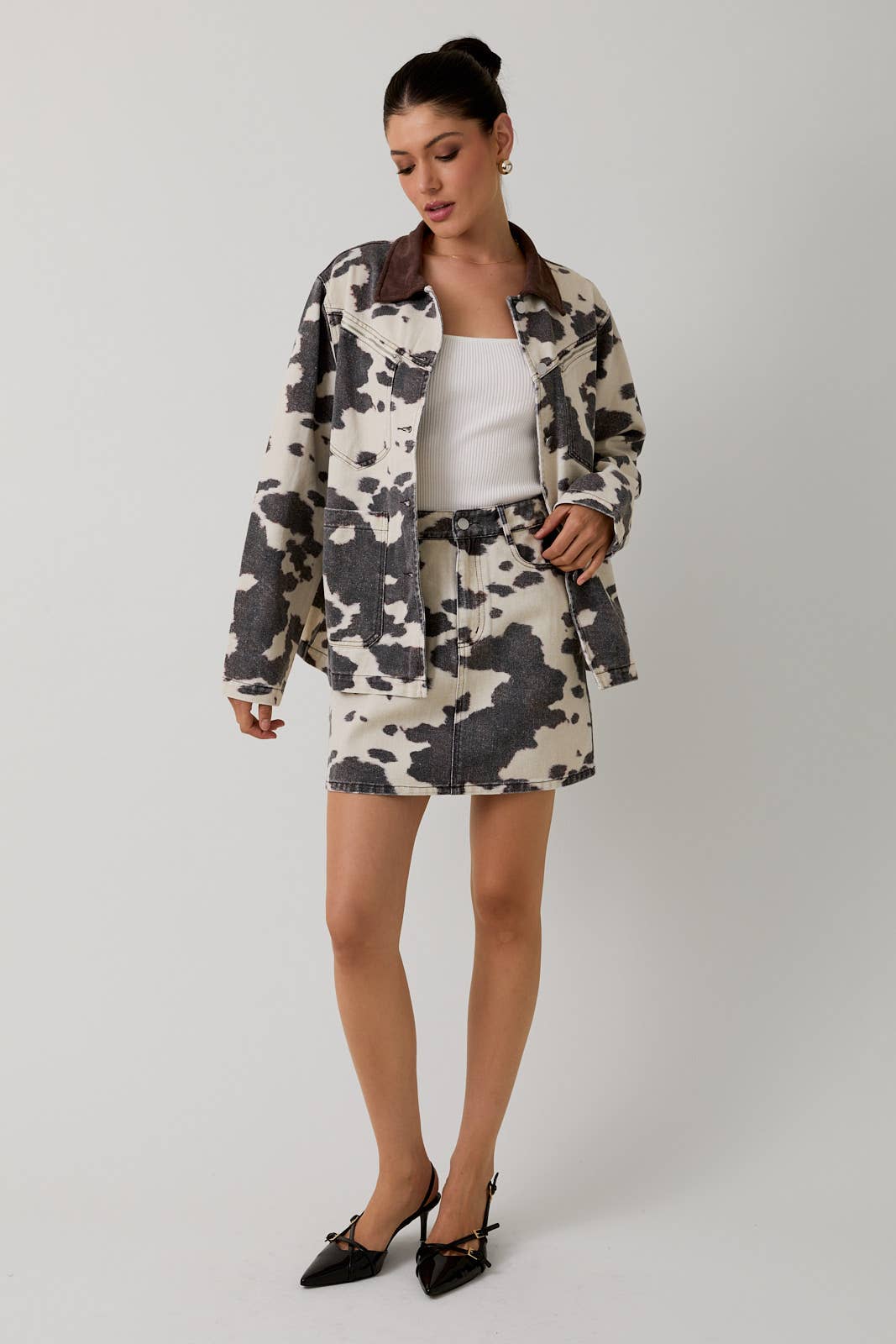 COW PRINT POCKET DETAIL MINI SKIRT