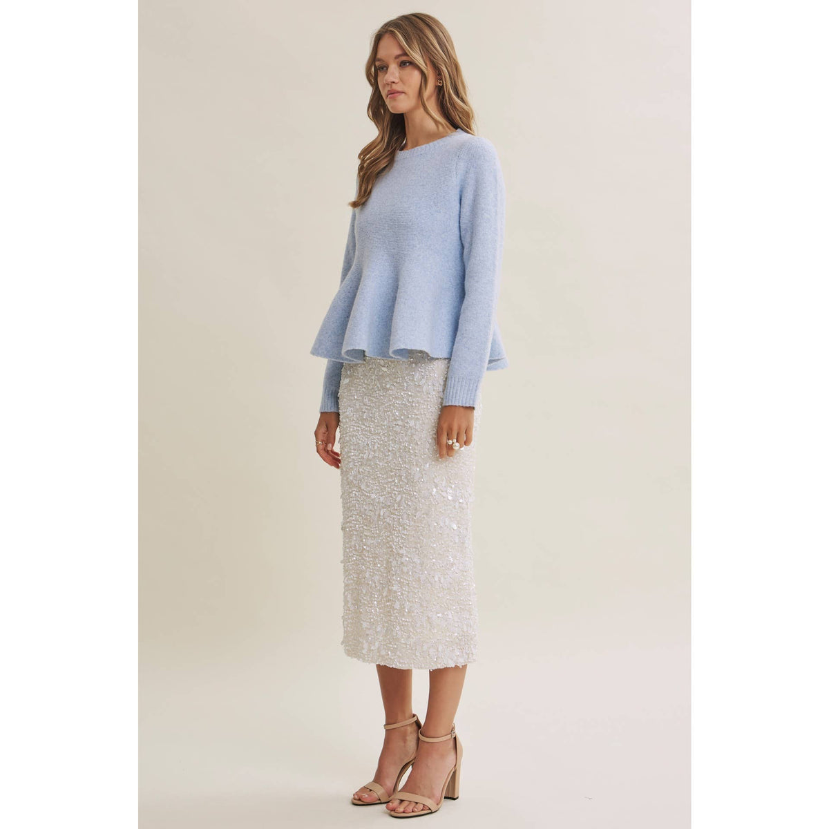 PEPLUM WOOL SWEATER