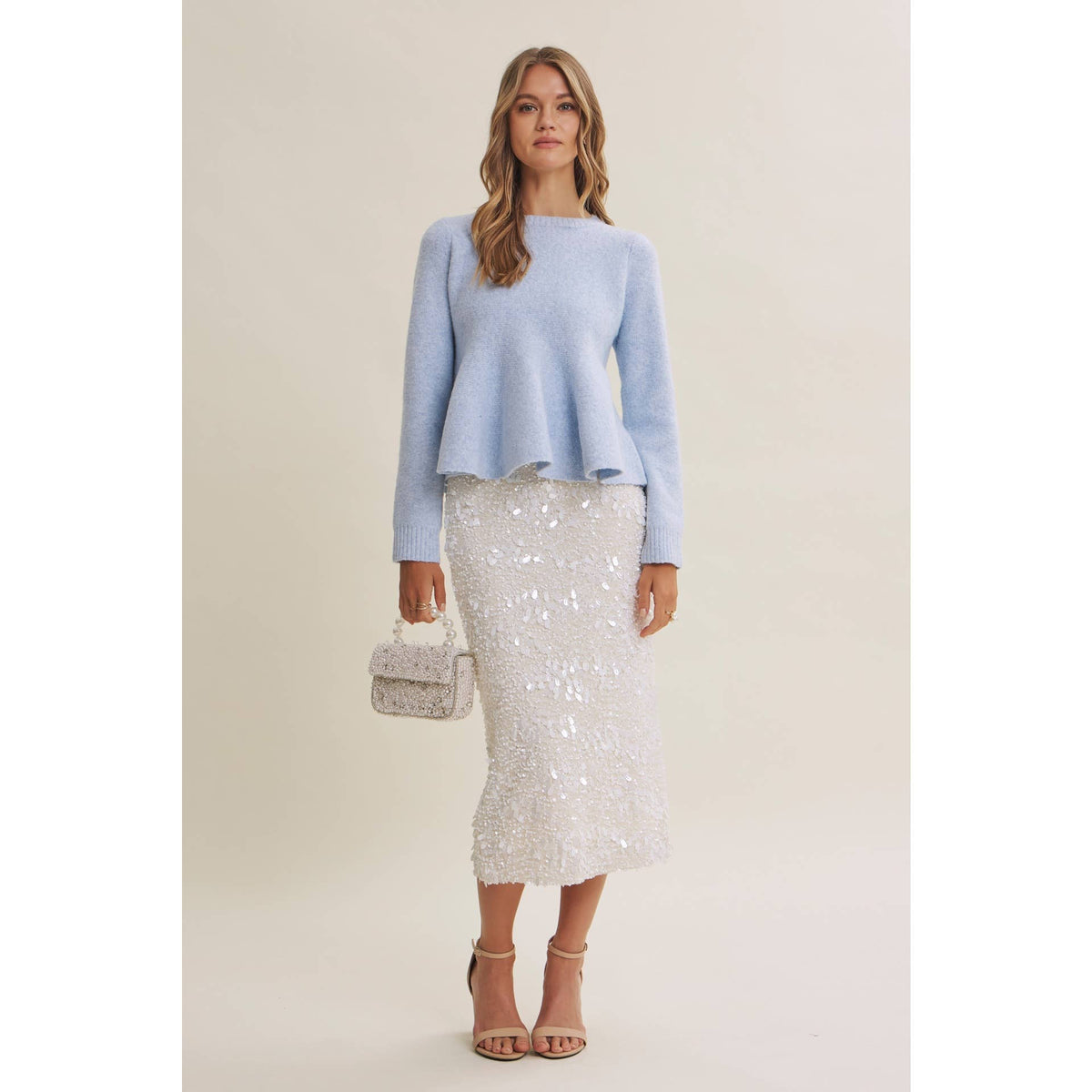 PEPLUM WOOL SWEATER