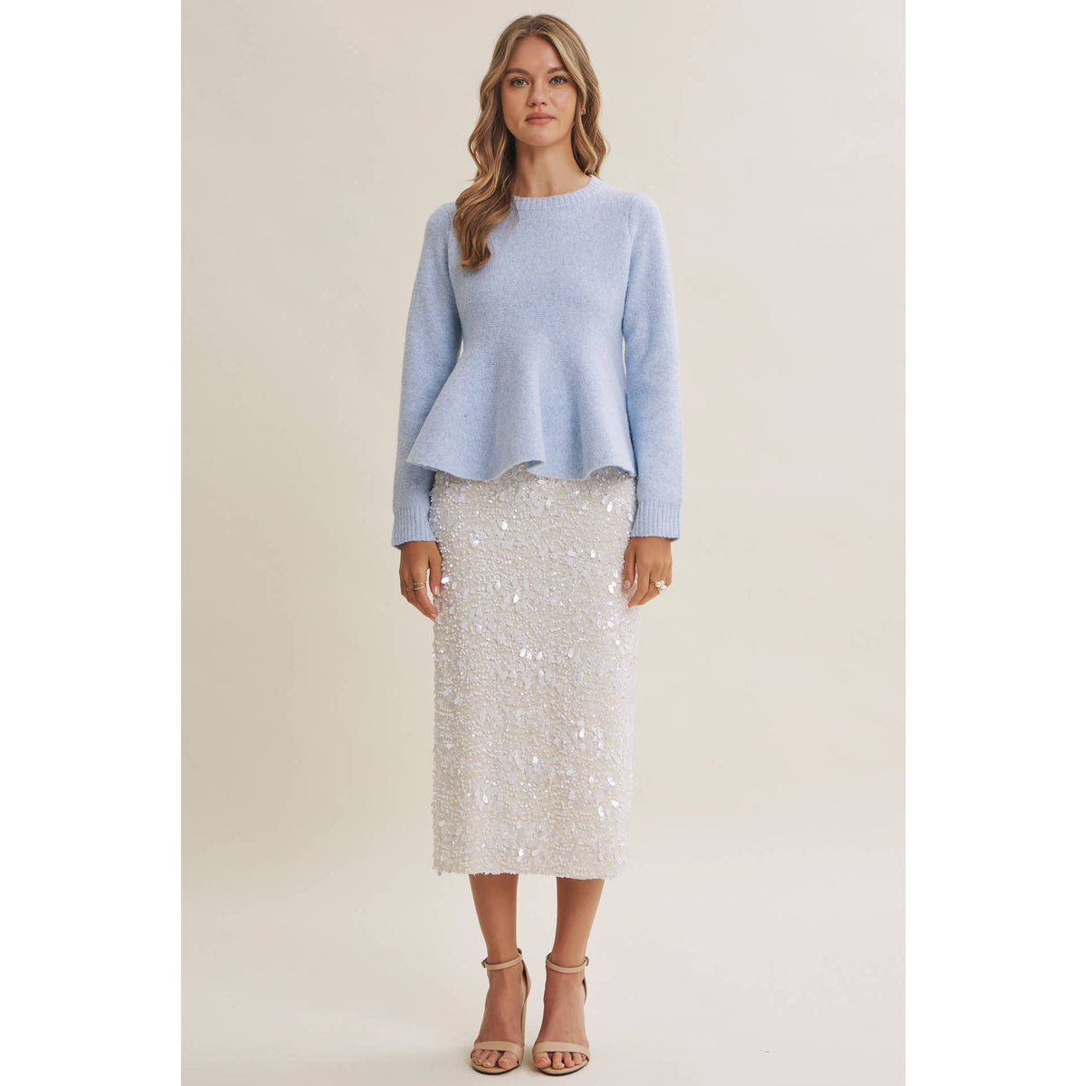 PEPLUM WOOL SWEATER