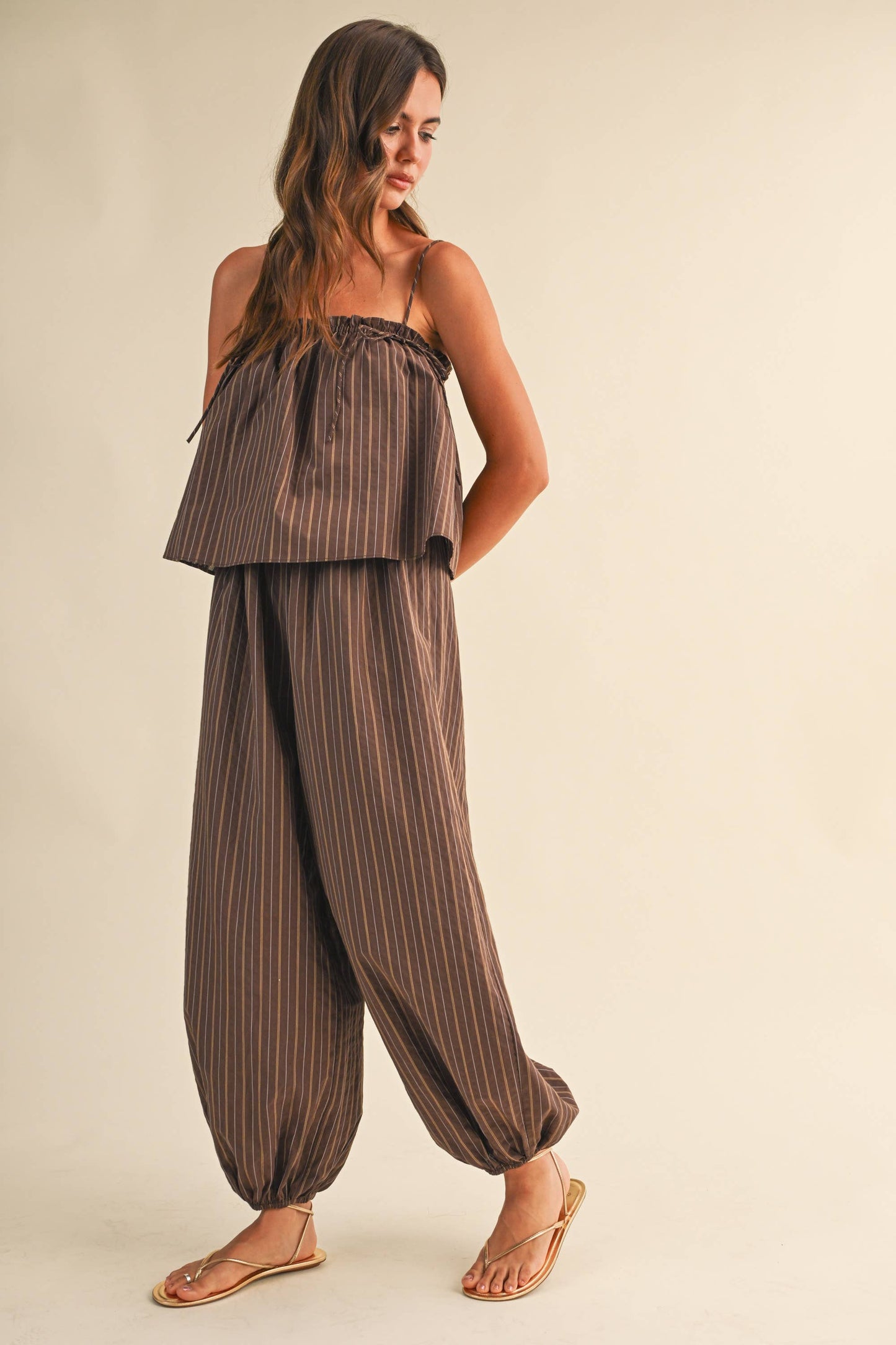 STRIPED SLEEVELESS FLOWY JUMPSUIT