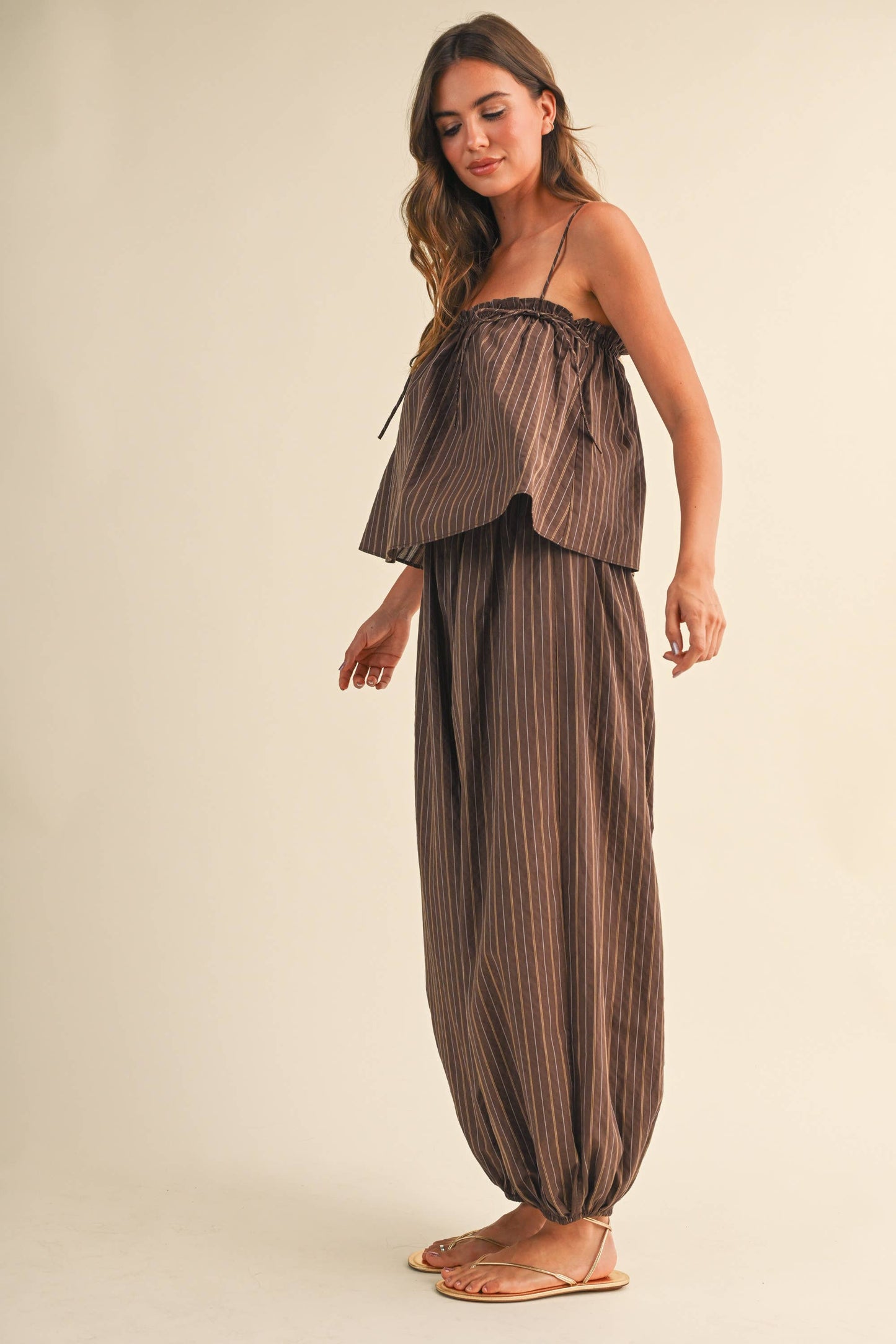 STRIPED SLEEVELESS FLOWY JUMPSUIT